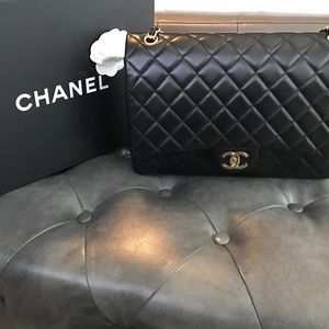 Authentic Chanel Maxi  Lamb skin single flap bag